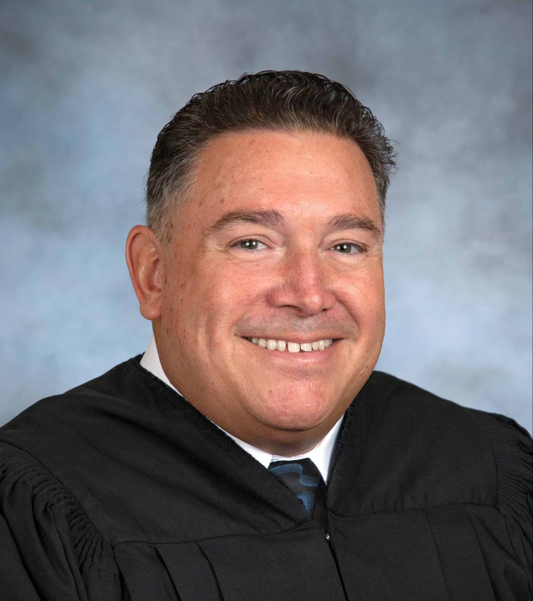 Hon. Judge Roger Lund